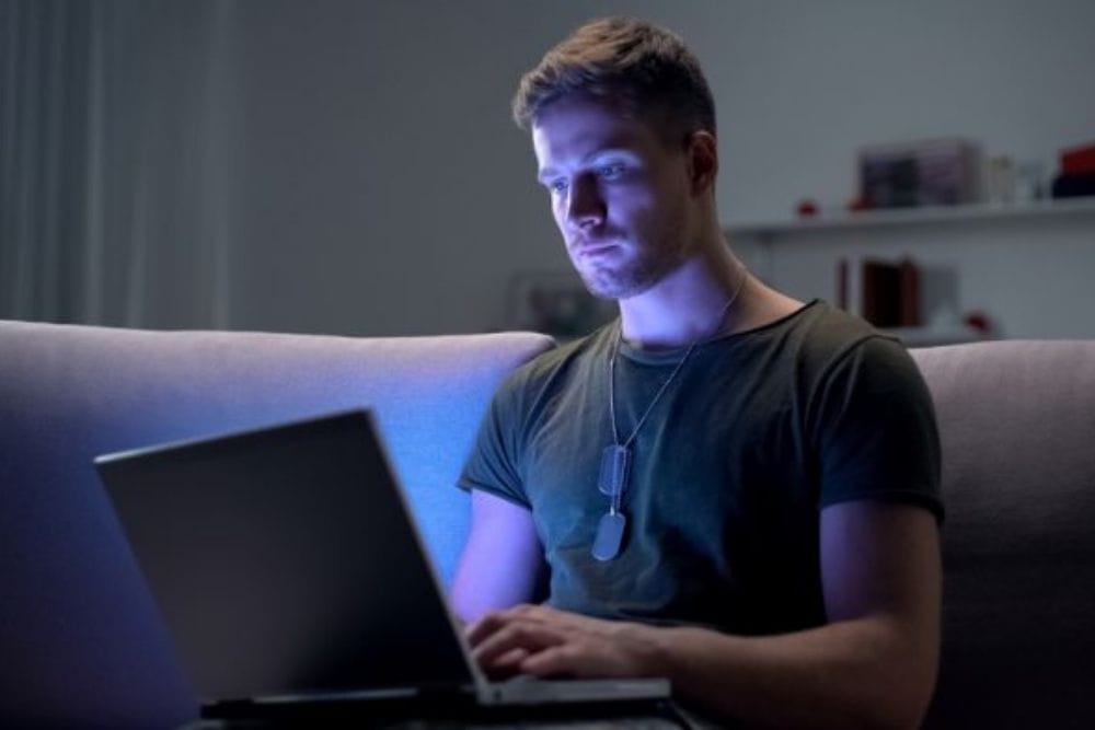 Veteran Student working on a laptop