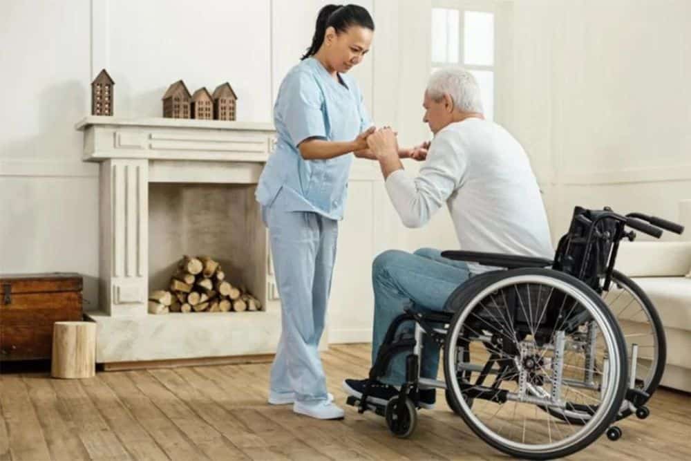 Professional caregiver looking after her patient