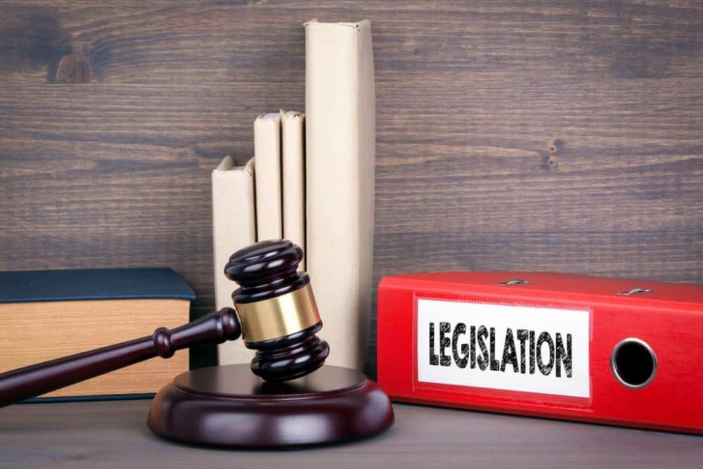 Legislation file and wooden gavel