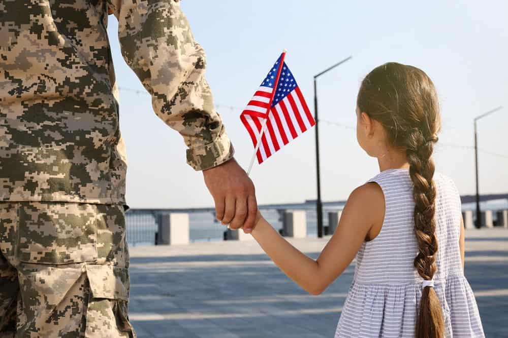 A veteran with his daughter