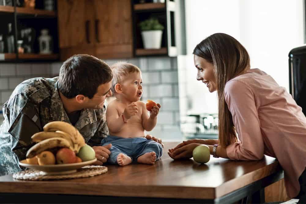 Happy military family enjoying together at home