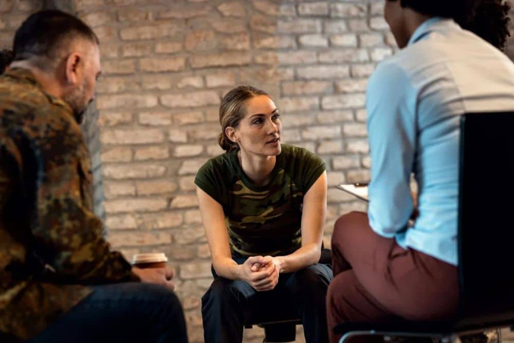 Veteran woman talking to therapist